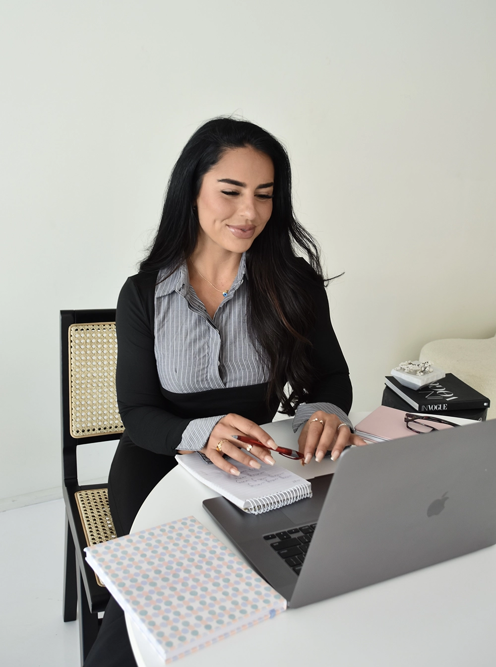 Elif working on laptop during a discovery call